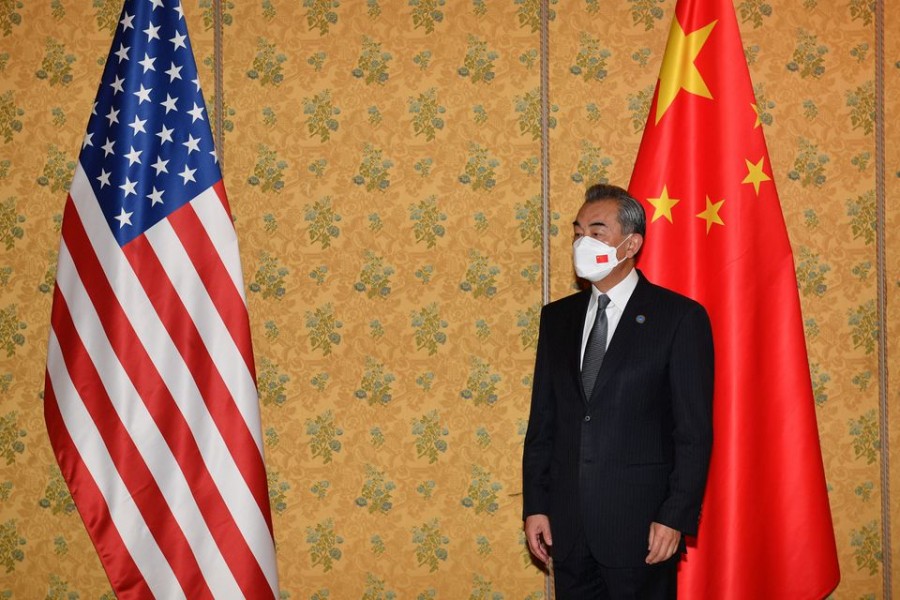 Chinese Foreign Minister Wang Yi poses for a picture before his meeting with US Secretary of State Antony Blinken, on the sidelines of the G20 summit in Rome, Italy October 31, 2021 – Tiziana Fabi/Pool via Reuters