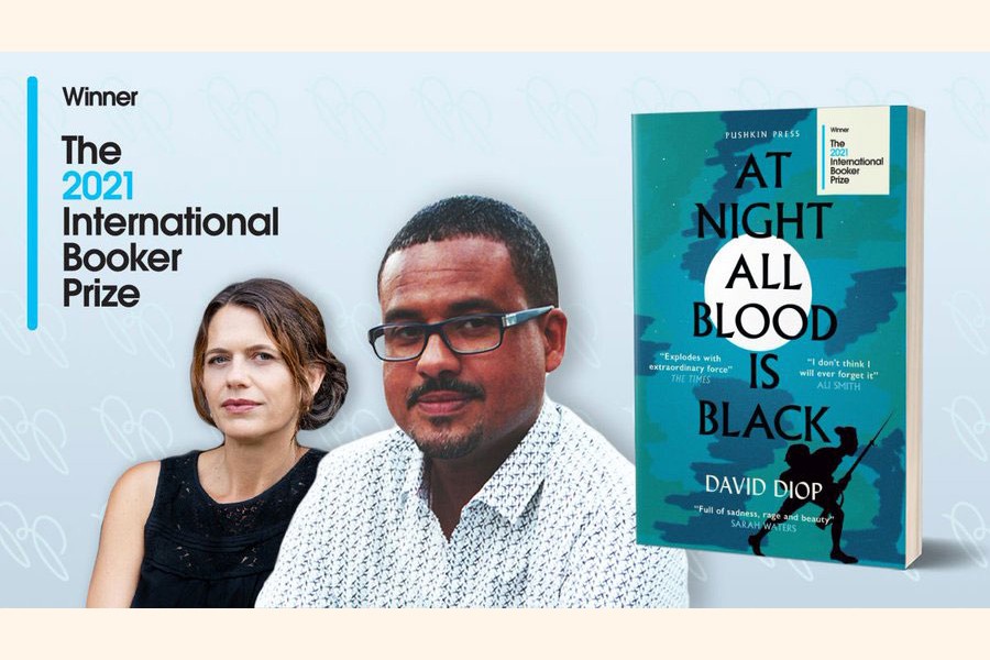 Translator Anna Moschovakis (L) with Booker Prize 2021 winner David Diop (R) and the book cover of  "At Night All Blood is Black"