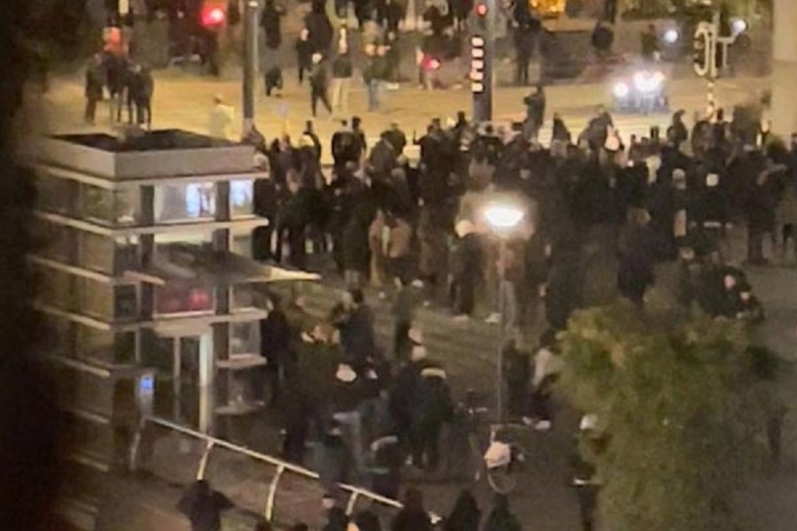 Protesters are seen during demonstrations against coronavirus disease (COVID-19) measures which turned violent in Rotterdam, Netherlands, November 19, 2021, in this still image obtained by Reuters from video provided on social media.