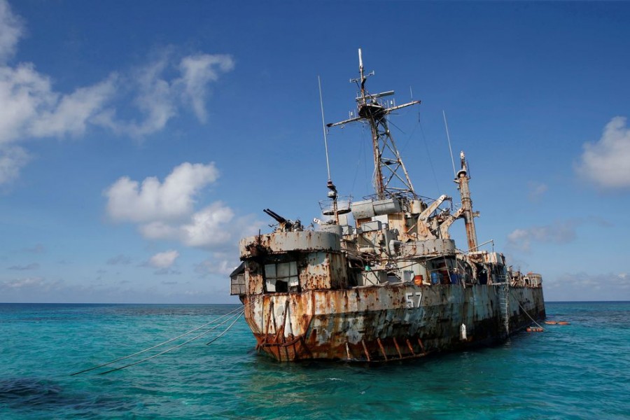 The BRP Sierra Madre, a marooned transport ship which Philippine Marines live on as a military outpost, is pictured in the disputed Second Thomas Shoal, part of the Spratly Islands in the South China Sea March 30, 2014. REUTERS/Erik De Castro/File Photo