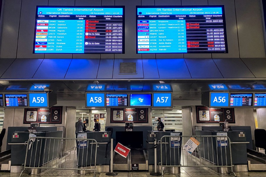 Digital display boards show cancelled flights to London - Heathrow at O.R. Tambo International Airport in Johannesburg, South Africa on November 26, 2021 — Reuters photo