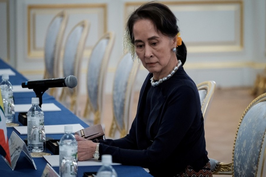 Myanmar's State Counsellor Aung San Suu Kyi waits for the arrival of her delegation before the Japan Myanmar Summit meeting with Japan's Prime Minster Shinzo Abe (not pictured) at Akasaka Palace State Guest House in Tokyo, Japan, Oct 9, 2018 – Nicolas Datiche/ Reuters