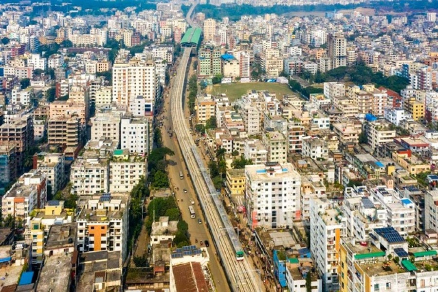 A metro rail train runs along the line at Dhaka’s Mirpur as part of a test trip on Sunday, Dec 12, 2021. Photo: Saad Abdullah/bdnews24.com