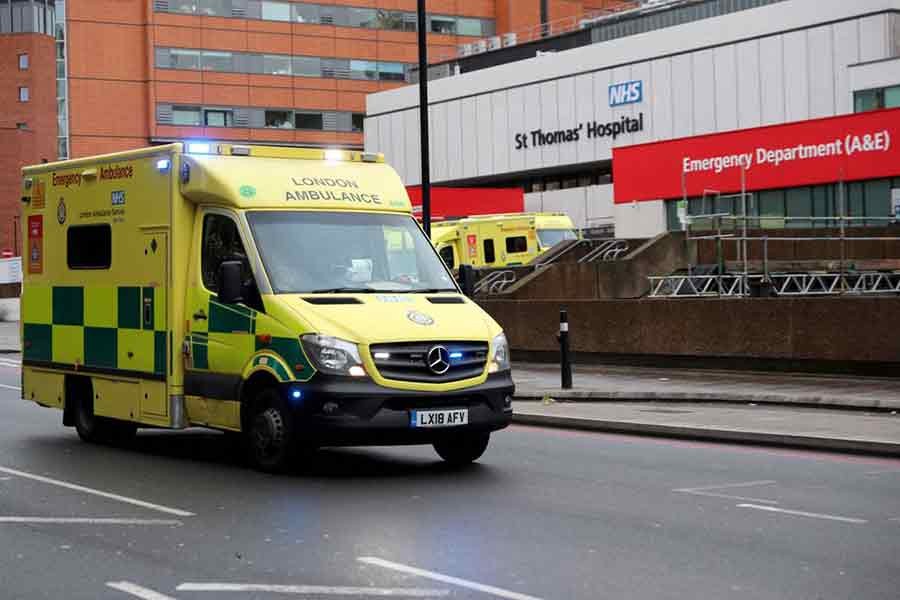 An ambulance driving past St Thomas' Hospital in London on Sunday amid the spread of the coronavirus disease (COVID-19) on Sunday –Reuters file photo