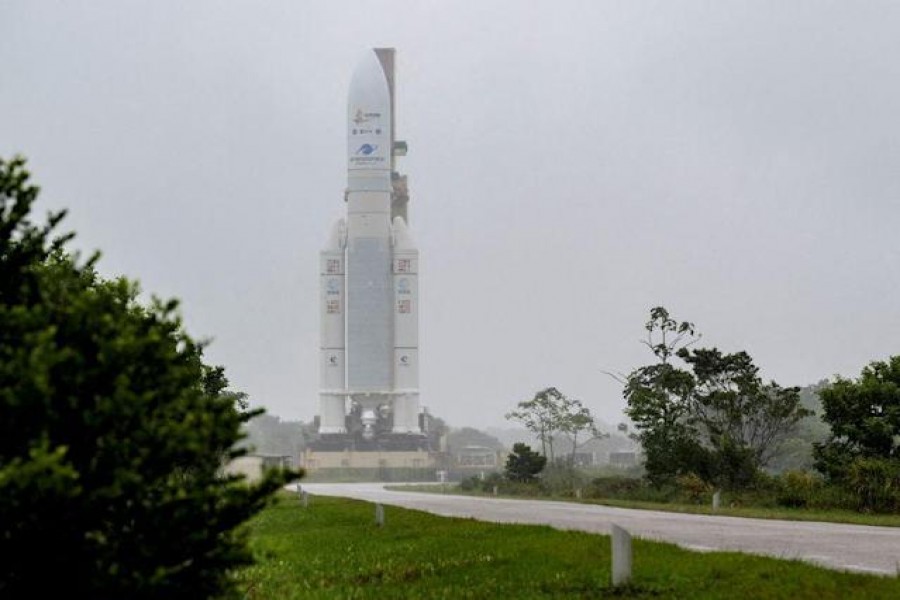 Arianespace's Ariane 5 rocket, with NASA's James Webb Space Telescope onboard, is rolled out to the launch pad at Europe’s Spaceport, the Guiana Space Center in Kourou, French Guiana December 23, 2021. Picture taken December 23, 2021. NASA/Bill Ingalls/Handout via REUTERS