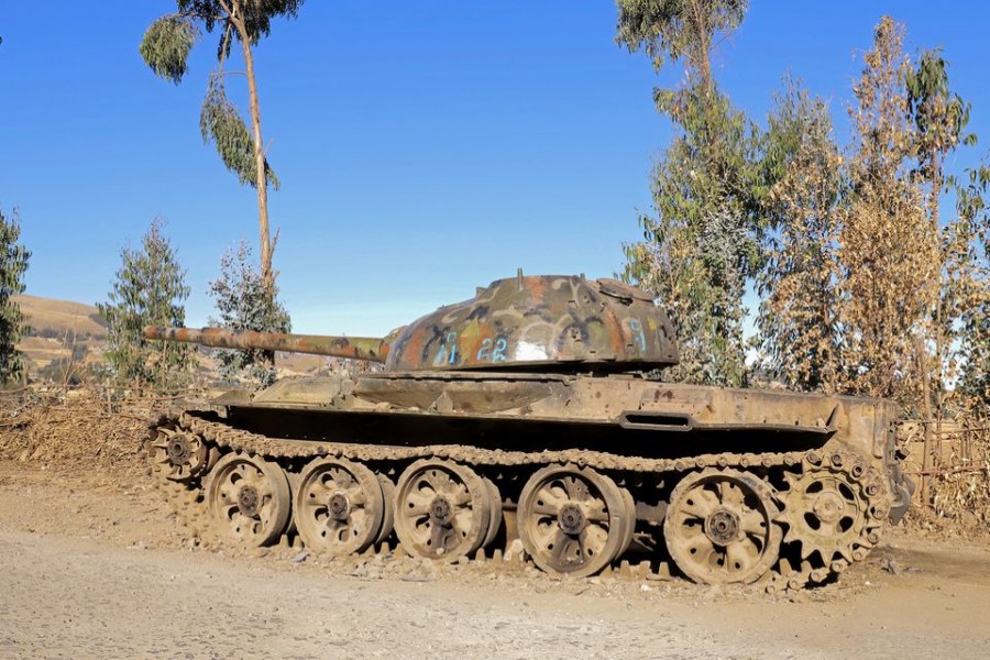 A military tank destroyed recently during fighting between the Ethiopian National Defense Force (ENDF) and the Tigray People's Liberation Front (TPLF) forces is seen on the roadside in Damot Kebele of Amhara region, Ethiopia December 7, 2021. REUTERS/Kumera Gemechu