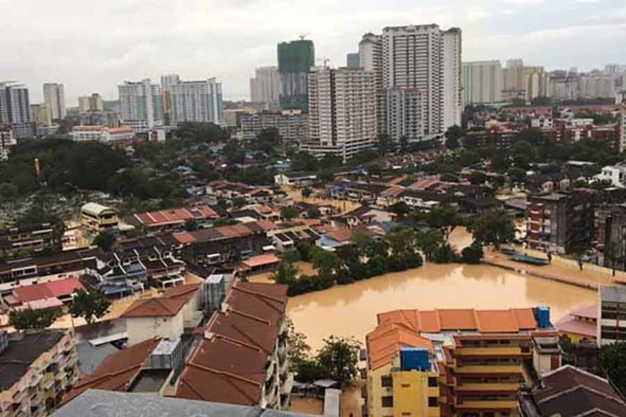 Floods hit seven states in Malaysia, affect over 125,000 people in two weeks