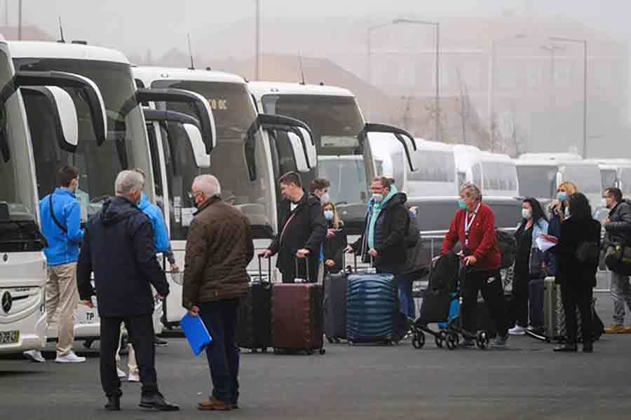 AIDAnova cruise passengers leaving Lisbon's port due to an outbreak of the coronavirus among the cruise's crew on Monday -Reuters photo