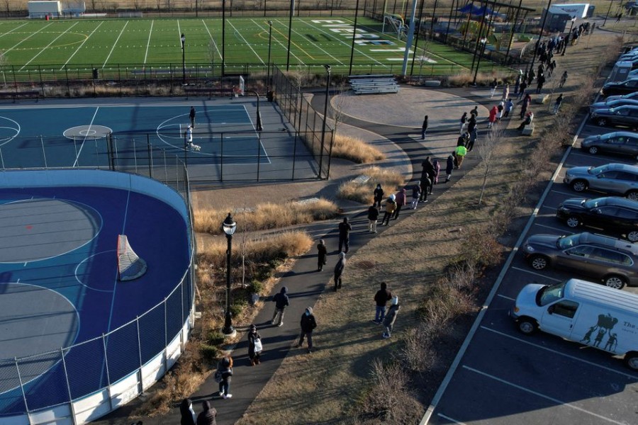 People line up in cold winter temperatures to be tested for the coronavirus disease (Covid-19) in Everett, Massachusetts, US on January 4, 2022. Picture taken with a drone — Reuters photo