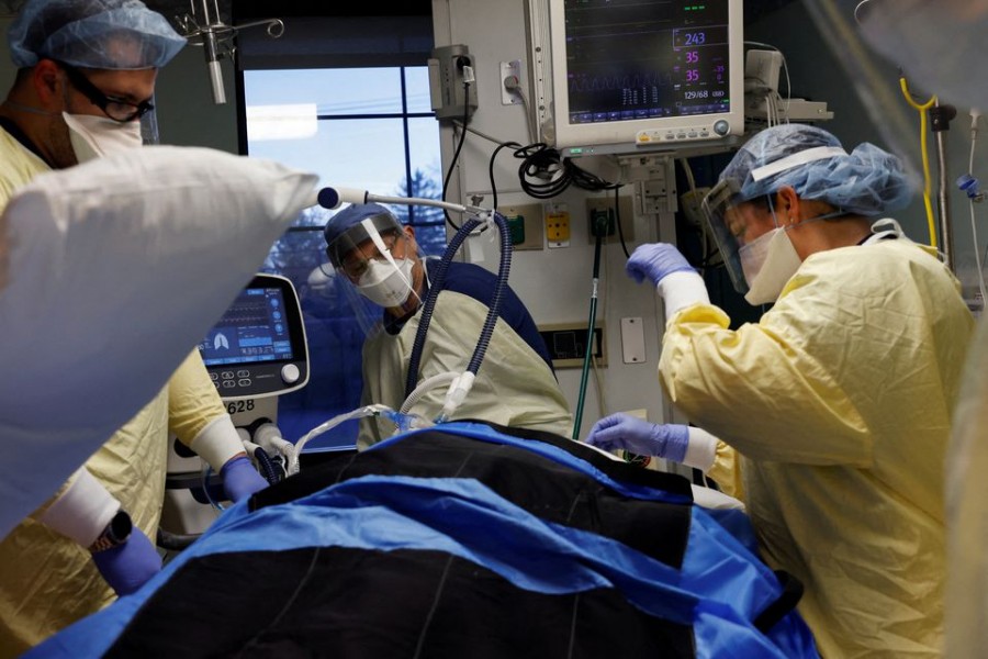 Medical staff treat a coronavirus disease (Covid-19) patient in their isolation room on the Intensive Care Unit (ICU) at Western Reserve Hospital in Cuyahoga Falls, Ohio, US on January 4, 2022 — Reuters photo