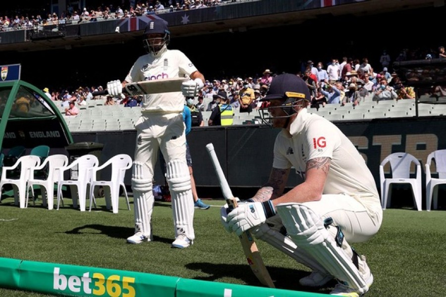 Cricket - Ashes - Third Test - Australia v England - Melbourne Cricket Ground, Melbourne, Australia - December 28, 2021 England's Ben Stokes and Joe Root before play REUTERS