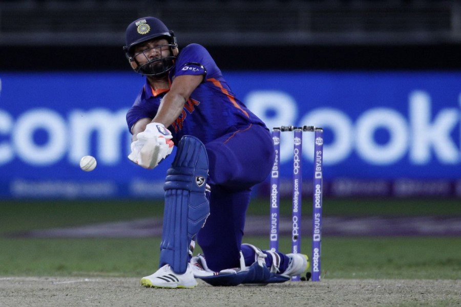 Cricket - ICC Men's T20 World Cup - Super 12 - Group 2 - India v Namibia - Dubai International Cricket Stadium, Dubai, United Arab Emirates - November 8, 2021 India's Rohit Sharma in action REUTERS/Hamad I Mohammed