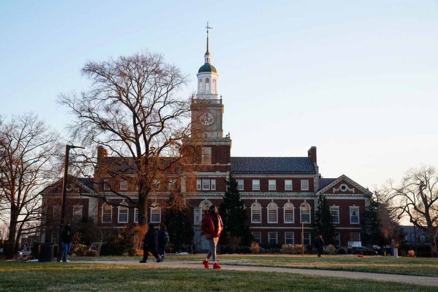 Students walk on the campus of Howard University, one of six historically Black colleges and universities (HBCUs) across the United States that received bomb threats, in Washington, US, January 31, 2022 – Reuters/Sarah Silbiger