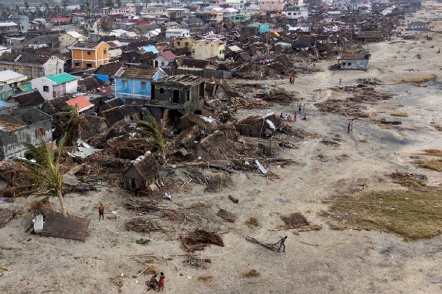 An aerial view shows damaged houses and debris on the beach, in the aftermath of Cyclone Batsirai, in Mananjary, Madagascar, February 8, 2022. Picture taken with a drone – Reuters/Alkis Konstantinidis TPX IMAGES OF THE DAY