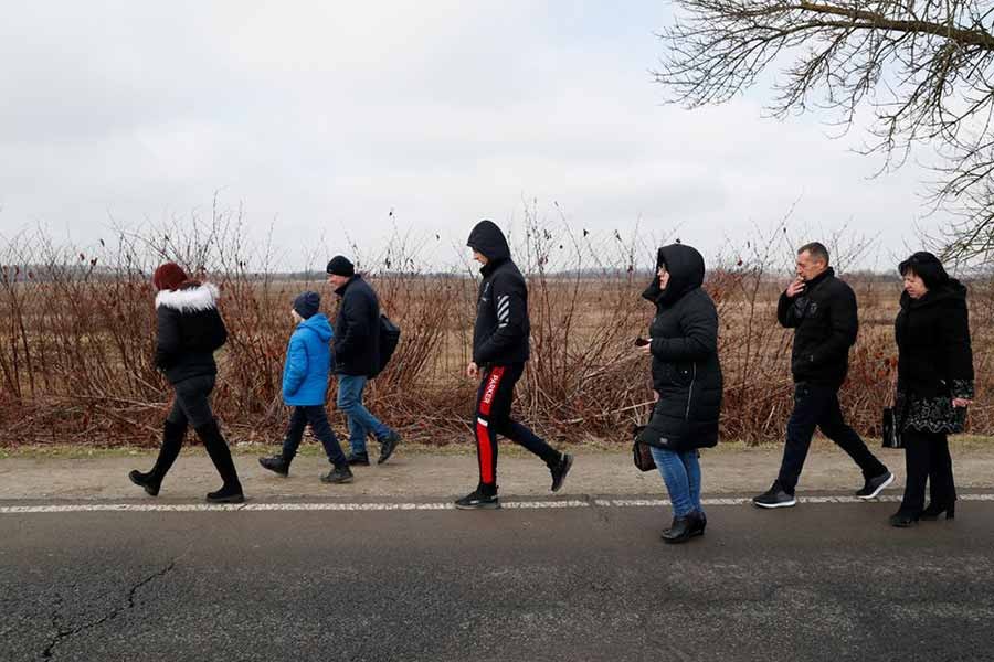 People fleeing from Ukraine at the Hungarian-Ukrainian border on Thursday after Russian President Vladimir Putin authorised a military operation –Reuters photo