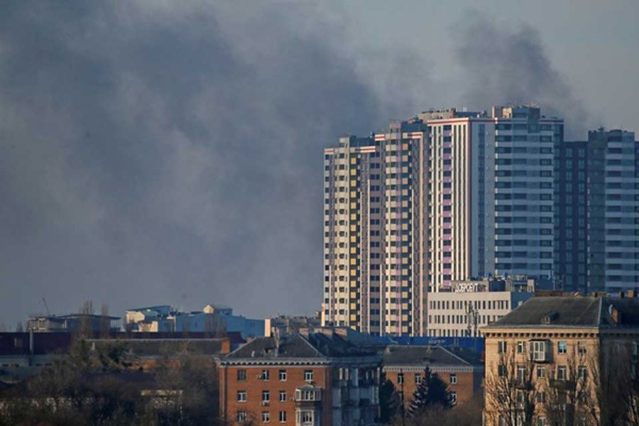 Smoke rises after recent shelling in Kyiv, Ukraine Feb 26, 2022. REUTERS/Gleb Garanich
