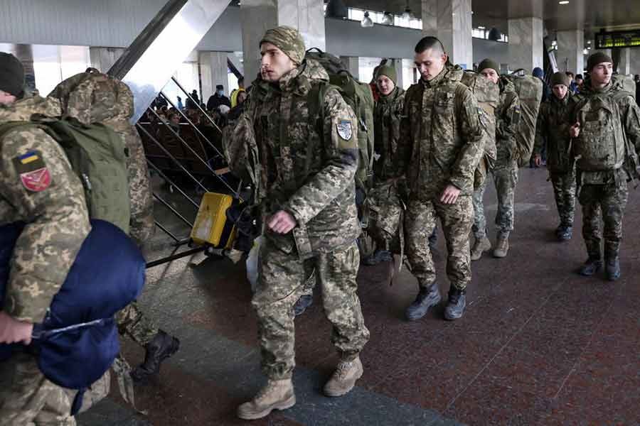 Ukrainian soldiers walking at Kyiv central train station on February 25 this year –Reuters file photo