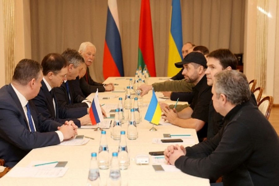Russian and Ukrainian officials take part in the talks in the Gomel region, Belarus February 28, 2022. Sergei Kholodilin/BelTA/Handout via REUTERS