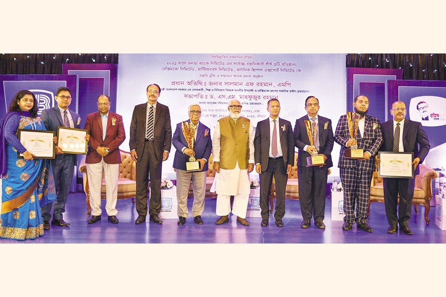 Recipients of the 'Best Exporter Award' conferred by Janata Bank Limited on its top three exporter-clients -- Beximco Group, Multi-fabs Limited and Organic Shrimps Limited -- pose with Prime Minister's private industry and investment adviser Salman F Rahman, Chairman of the bank Dr SM Mahfuzur Rahman and its Managing Director and CEO Md Abdus Salam Azad at the award ceremony at a city hotel on Sunday