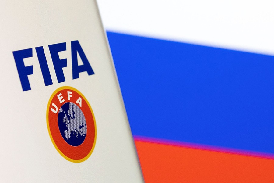 FIFA and UEFA logos are displayed in front of the Russian flag in this illustration taken on February 28, 2022 — Reuters photo