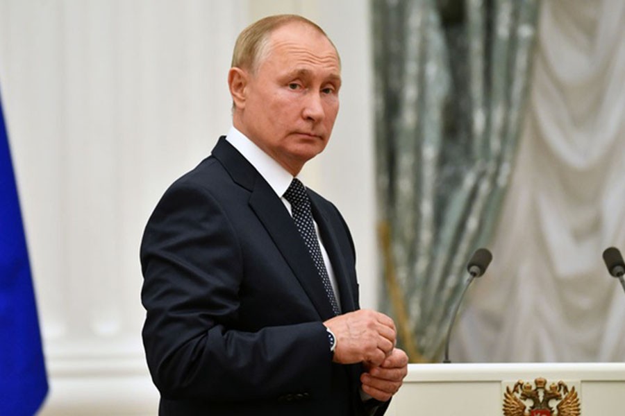 Russian President Vladimir Putin looks on during a meeting with athletes, participants of the 2020 Tokyo Olympic Games, in Moscow, Russia September 11, 2021. Sputnik via REUTERS