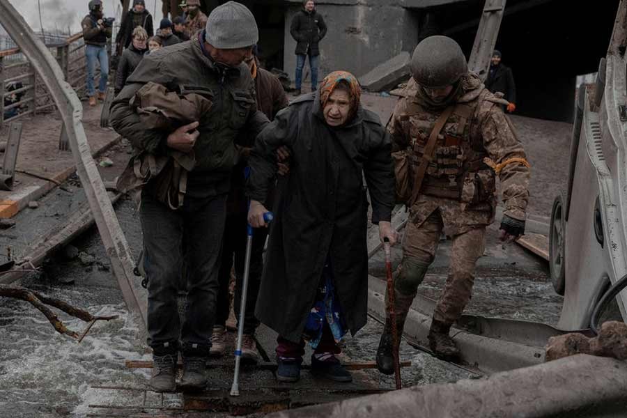 An elderly woman trying to leave the city of Irpin in the Kyiv region of Ukraine on Saturday –Reuters photo