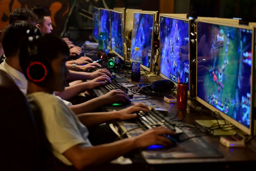 People play online games at an internet cafe in Fuyang, Anhui province, China August 20, 2018. REUTERS/Stringer