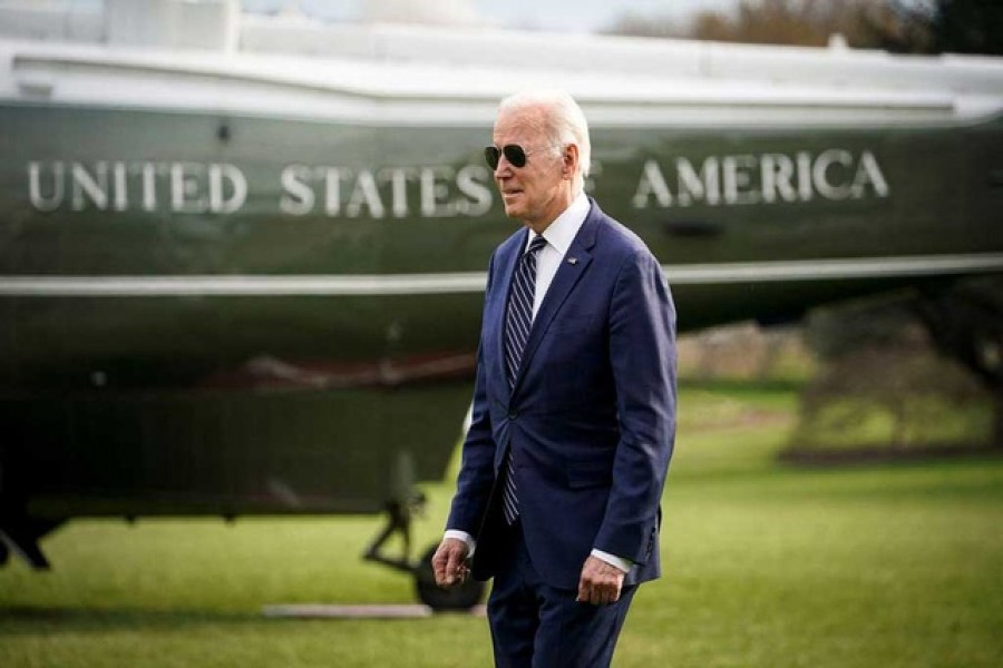 US President Joe Biden walks to board Marine One, before traveling to Rehoboth Beach, Delaware for the weekend, on the South Lawn of the White House in Washington, US, March 18, 2022 – Reuters/Files