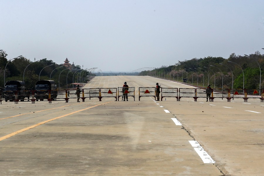Soldiers stand guard at a Myanmar's military checkpoint on the way to the congress compound in Naypyitaw, Myanmar on February 1, 2021 — Reuters photo