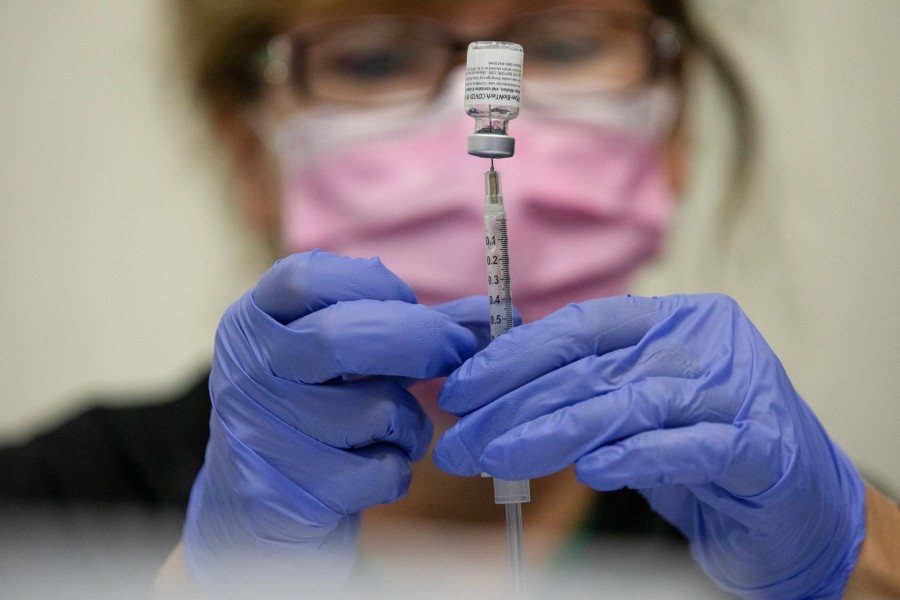 A nurses fills up syringes for patients as they receive their coronavirus disease (Covid-19) booster vaccination during a Pfizer-BioNTech vaccination clinic in Southfield, Michigan, US on September 29, 2021 — Reuters/Files