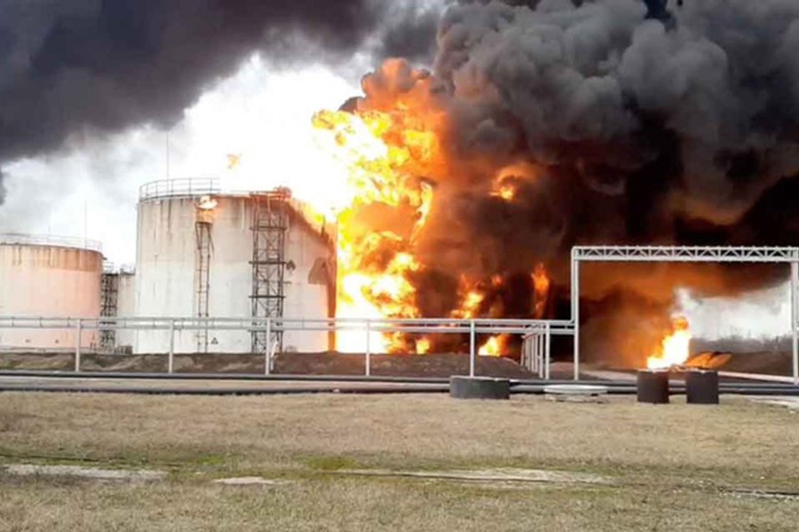 A still image taken from video footage shows a fuel depot on fire in the city of Belgorod, Russia April 1, 2022. Russian Emergencies Ministry/Handout via REUTERS