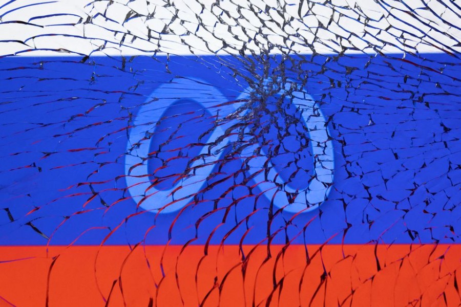 Meta logo and Russian flag are seen through broken glass in this illustration taken on March 1, 2022 — Reuters/Files