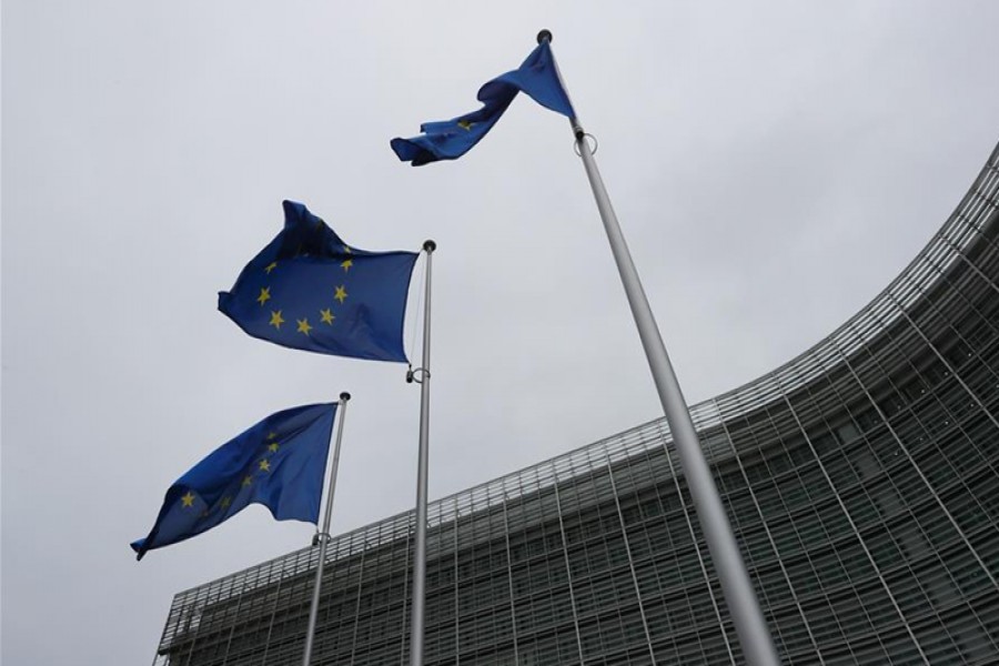 European Union flags flutter outside the EU Commission headquarters in Brussels, Belgium May 5, 2021. REUTERS