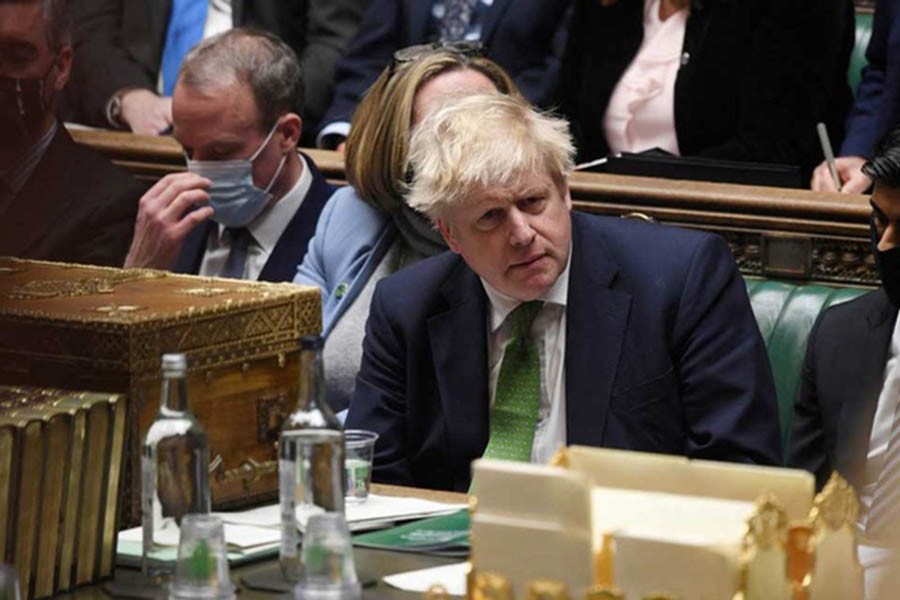 British Prime Minister Boris Johnson listens during the weekly question time debate at Parliament in London, Britain, Jan 19, 2022. UK Parliament/Jessica Taylor/REUTERS