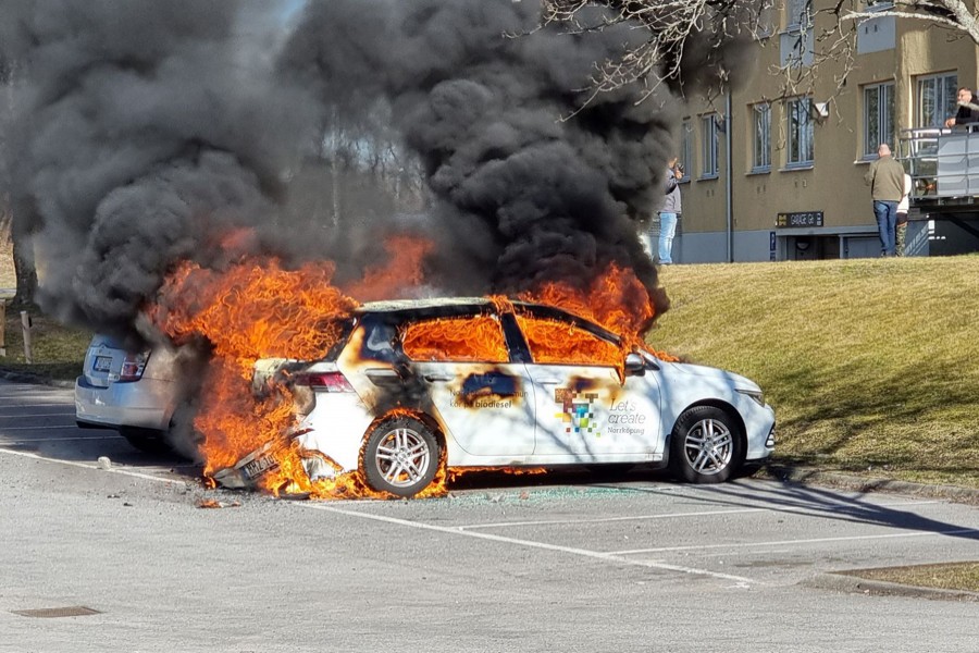 Smoke billows from a burning car during a riot ahead of a demonstration planned by Danish anti-Muslim politician Rasmus Paludan and his Stram Kurs party, which was to include a burning of the Muslim holy book Koran, in Navestad, Norrkoping, Sweden on April 17, 2022 — Wighsnews/Handout via REUTERS