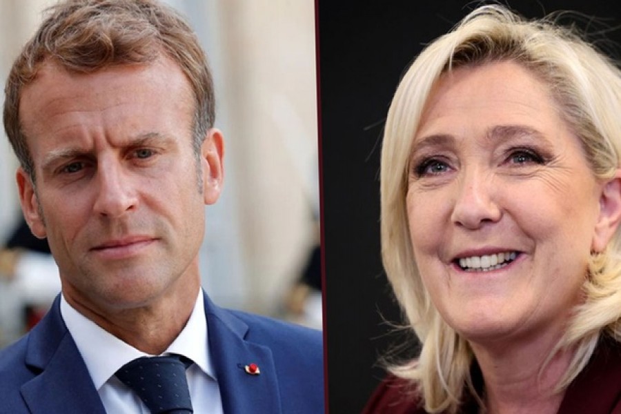 Emmanuel Macron (L) and Marine Le Pen. Reuters