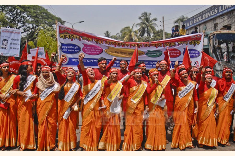 Workers at a rally in Dhaka on May 1, 2018 to observe the historic May Day. 	—bdnews24.com Photo