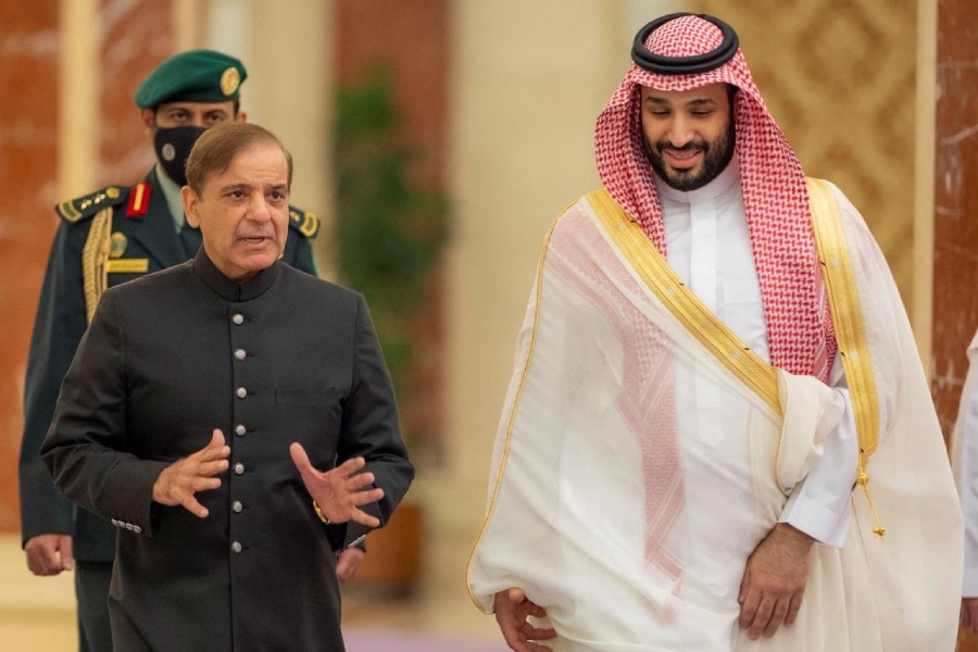 Saudi Crown Prince Mohammed bin Salman meets Pakistan's Prime Minister Shehbaz Sharif upon his arrival in Jeddah, Saudi Arabia, April 29, 2022. Bandar Algaloud/Courtesy of Saudi Royal Court/Handout via REUTERS