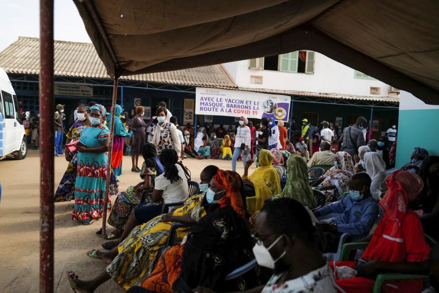 People wait to receive a dose of coronavirus disease (COVID-19) vaccine at Philippe Senghor Hospital in Dakar, amid a surge of coronavirus disease (COVID-19) cases in Senegal July 28, 2021. REUTERS/Zohra Bensemra