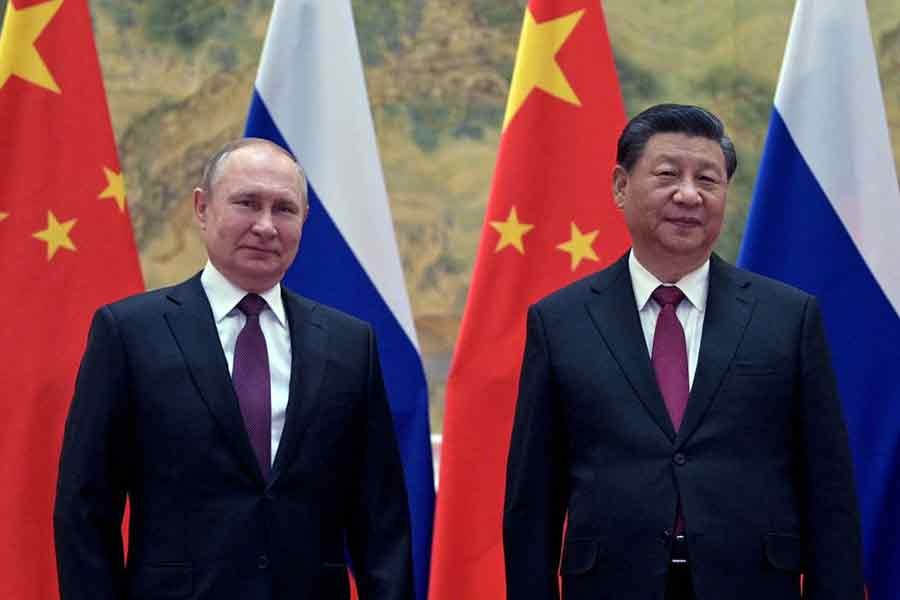 Russian President Vladimir Putin attending a meeting with Chinese President Xi Jinping in Beijing on February 4 this year –Reuters file photo