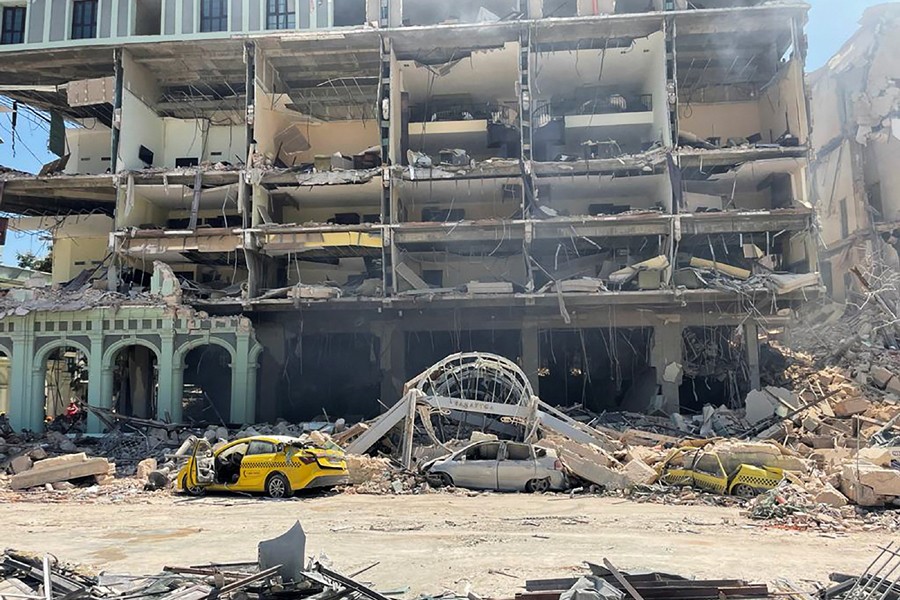 Debris is scattered after an explosion destroyed the Hotel Saratoga, in Havana, Cuba on May 6, 2022 — Reuters photo