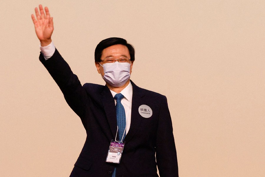 John Lee waves on stage after being elected as Hong Kong's Chief Executive, in Hong Kong, China on May 8, 2022 — Reuters photo