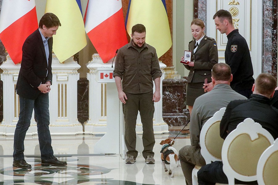 Canadian Prime Minister Justin Trudeau and Ukraine's President Volodymyr Zelenskiy award service dog "Patron" during a news conference, as Russia's attack on Ukraine continues, in Kyiv, Ukraine on May 8, 2022 — Reuters photo