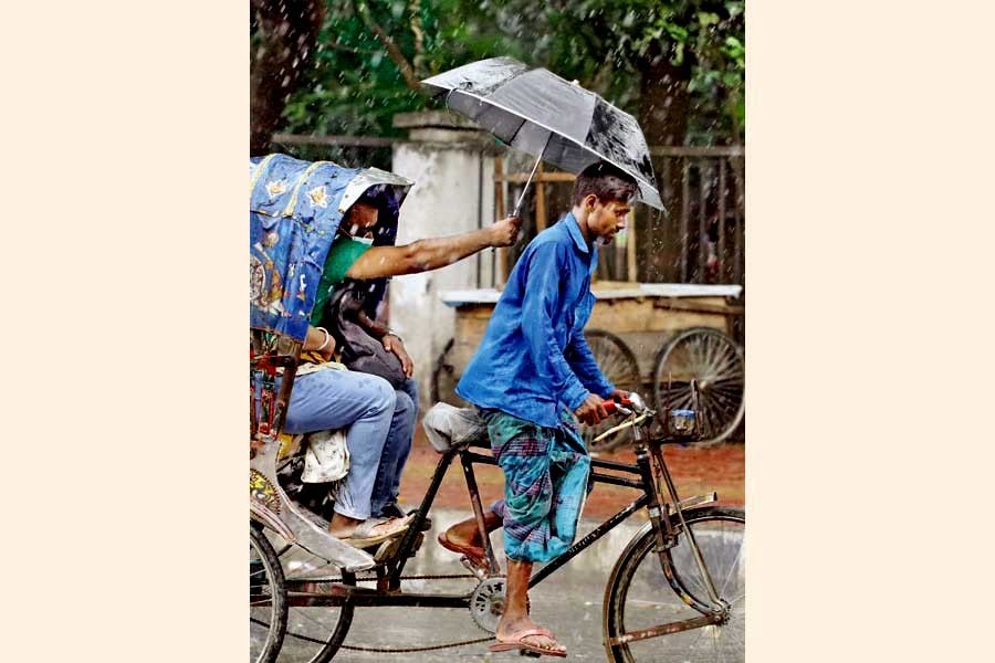 The passengers, as spotted in this photo travelling in a rickshaw at Shahbagh during the rain recently, manage to take shelter under its hood, while one of them holds an umbrella over the rickshaw-puller's head - a nice gesture indeed —FE file photo