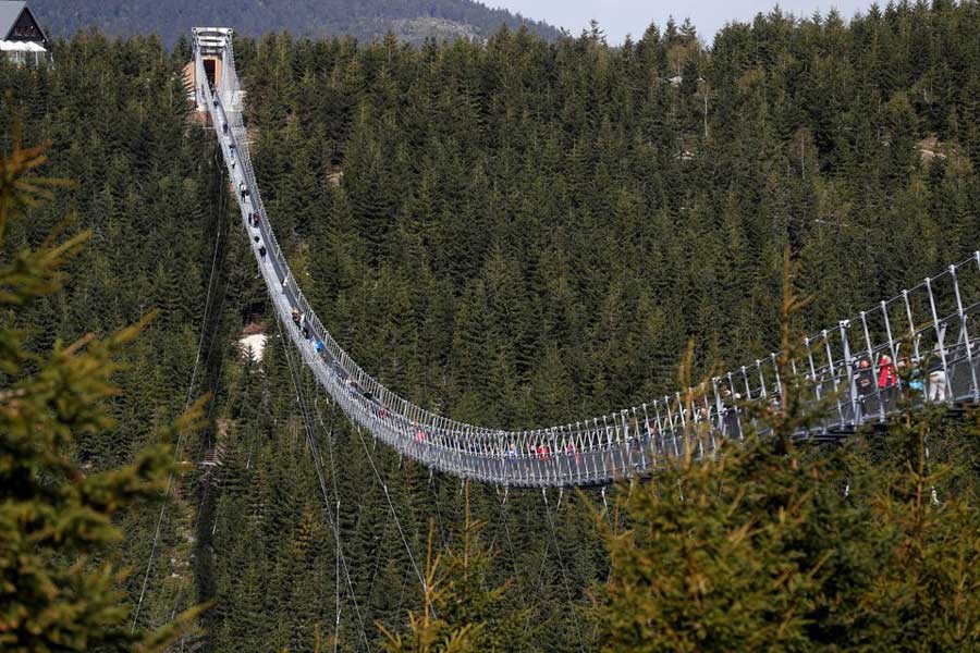 People walking across the newly-built world's longest suspension bridge after its official opening in the mountain resort of Dolni Morava in Czech Republic on Friday –Reuters photo