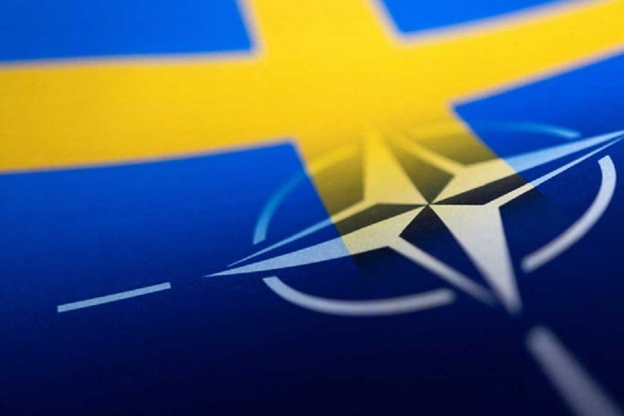 Swedish and NATO flags are seen printed on paper this illustration taken April 13, 2022. Reuters