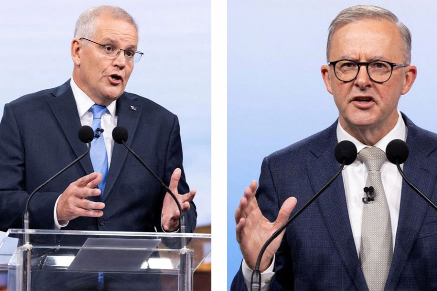 Australian incumbent Prime Minister Scott Morrison (left) and Australian Opposition Leader Anthony Albanese addressing a debate of the 2022 federal election campaign at the Nine studio in Sydney on May 8 this year –Reuters photos