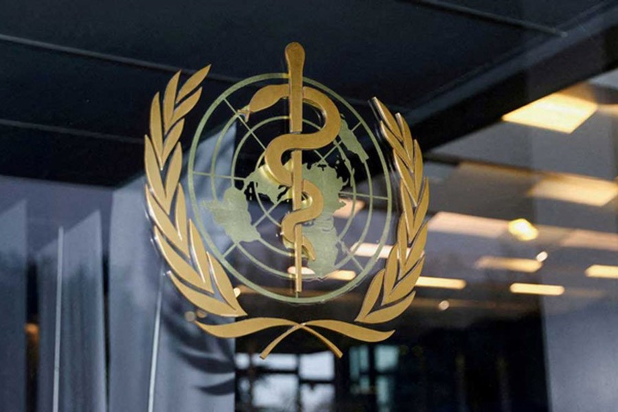 The World Health Organisation logo is pictured at the entrance of the WHO building, in Geneva, Switzerland, Dec 20, 2021. REUTERS/Denis Balibouse/File