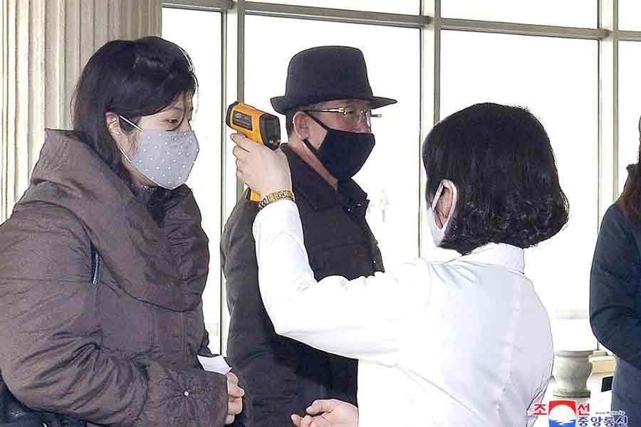 Volunteers carrying out temperature screening during an anti-virus campaign in Pyongyang of North Korea in 2020 –KCNA file photo