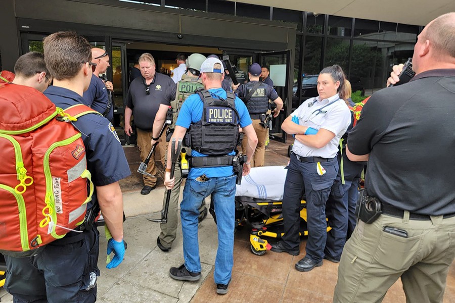 Emergency personnel work at the scene of a shooting at the Warren Clinic in Tulsa, Oklahoma, US on June 1, 2022 — Handout via Reuters